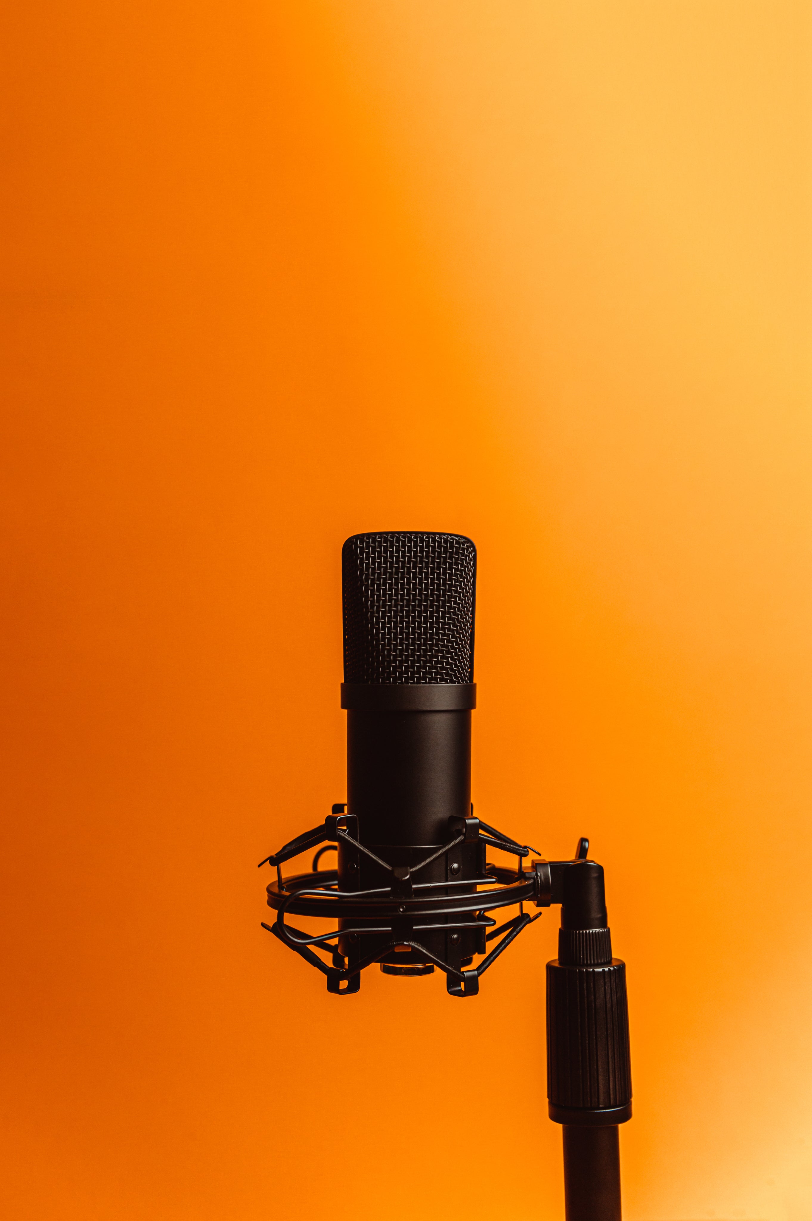 black-microphone-against-orange-photo.jpg